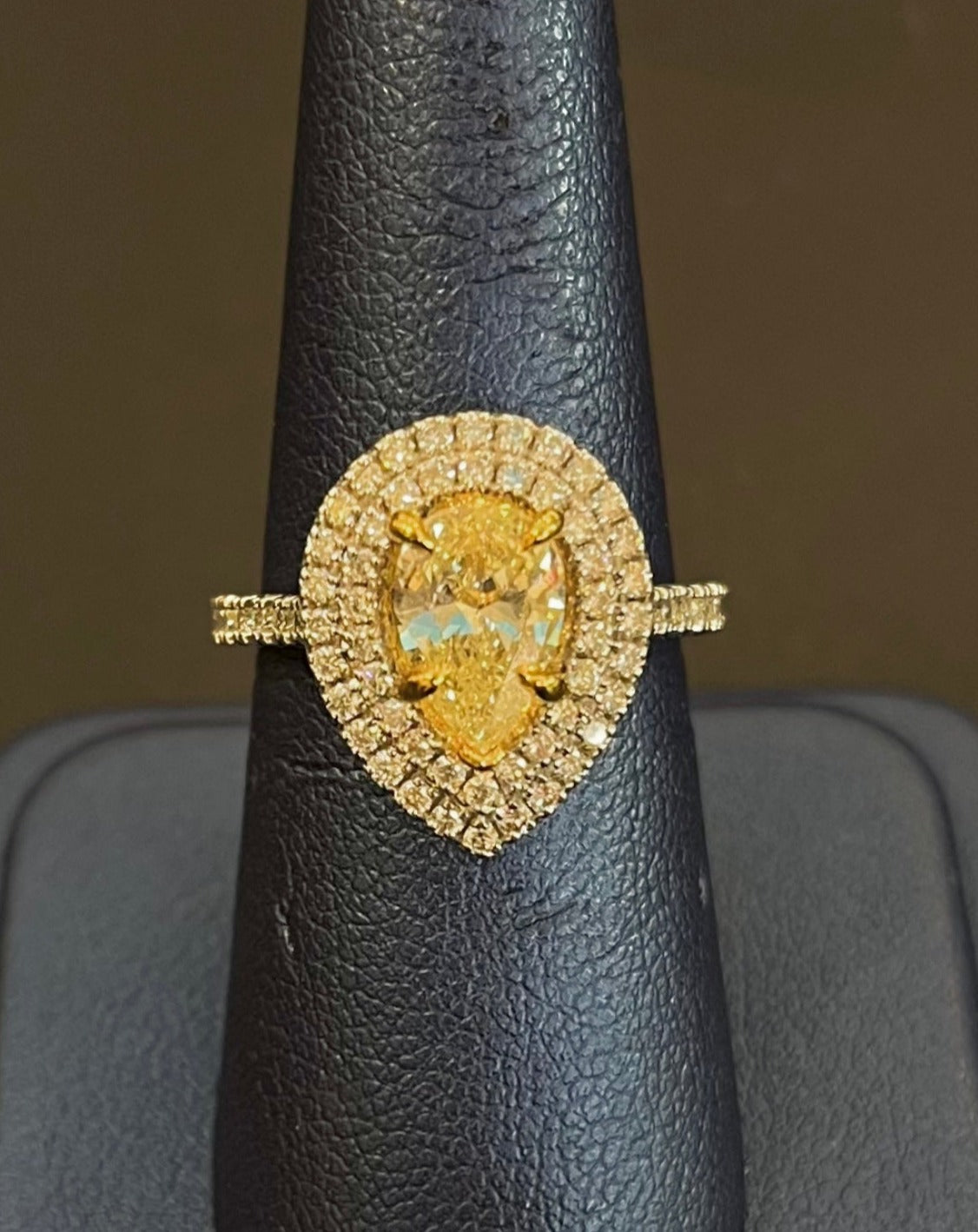 Pear shaped yellow diamond deals engagement ring