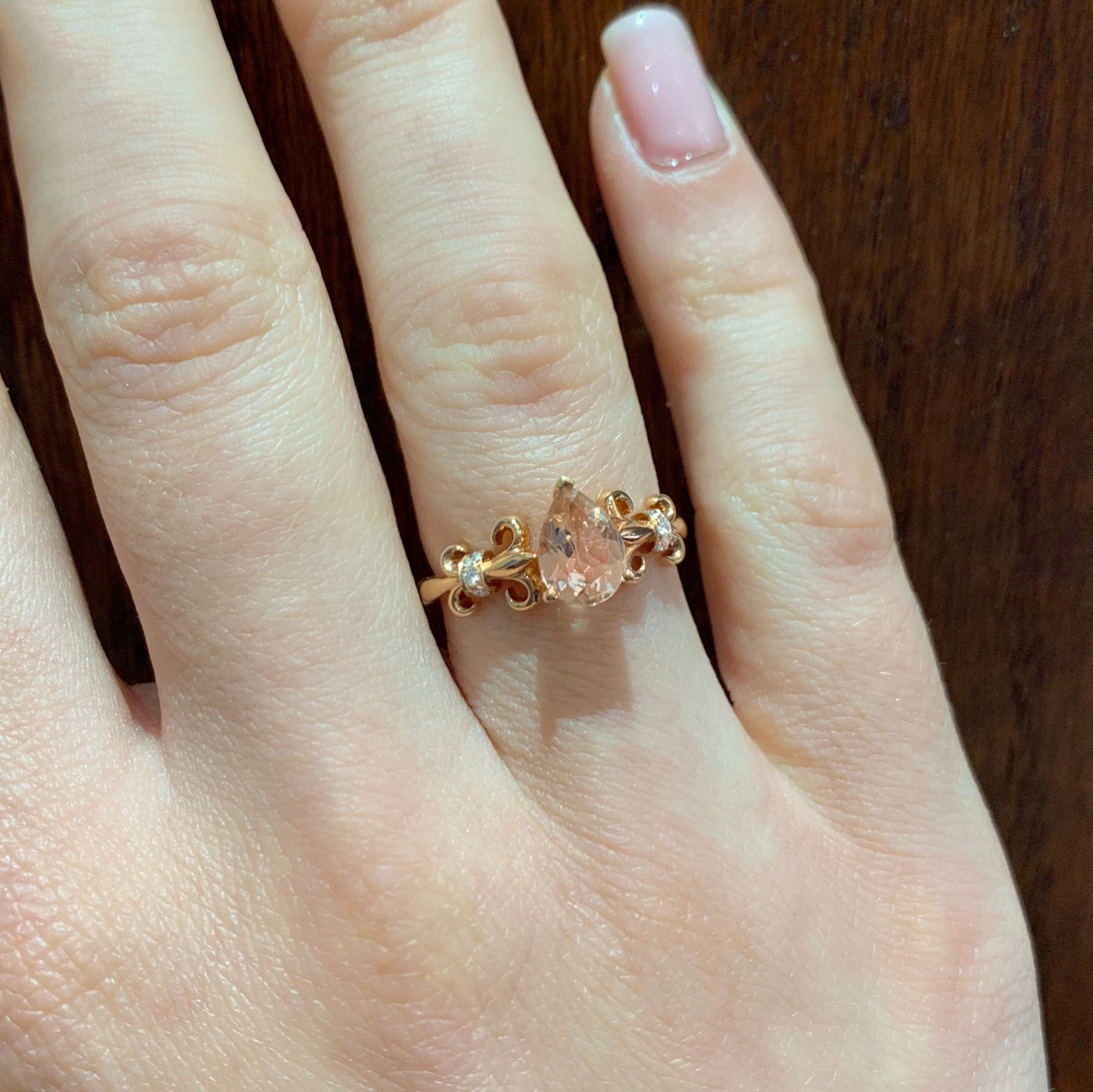 Rose Gold Fleur-de-lis Ring with Pear Shaped Morganite Anniversary Ring - Michael E. Minden Diamond Jewelers